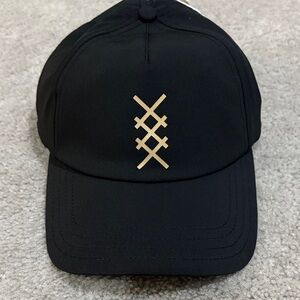 RHONE Black Hat with Gold Emblem